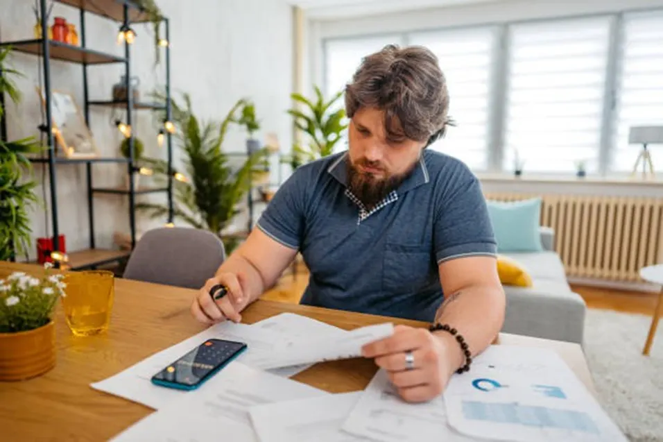 Man reviewing health documents