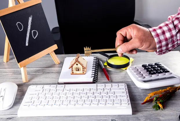 Mortgage interest rate concept with house model