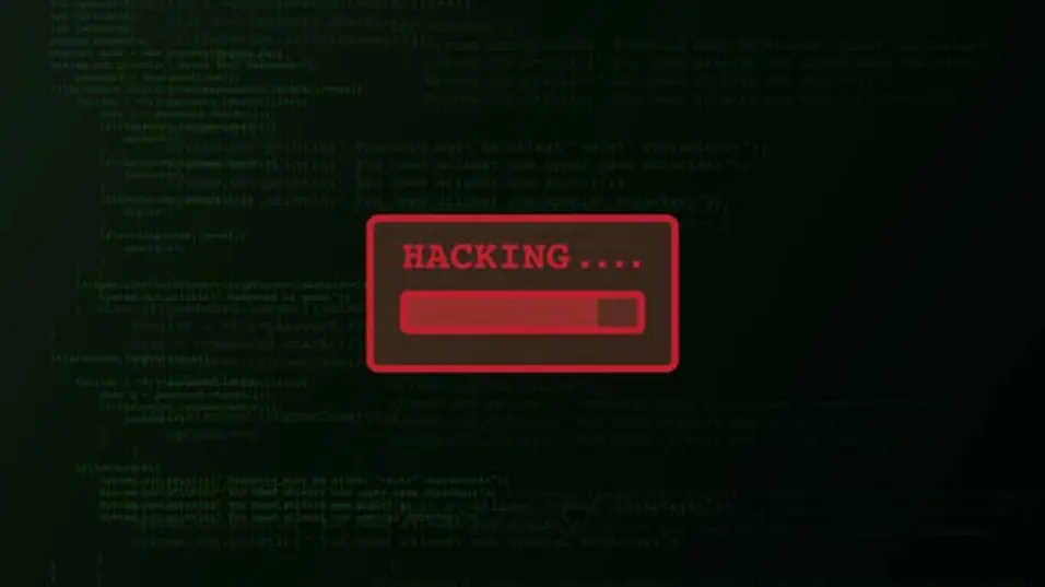 Dark screen with green code and a red HACKING progress bar overlay