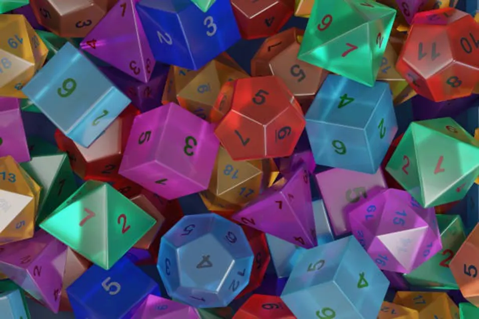 Pile of colourful multi-sided polyhedral dice in various shapes and colours